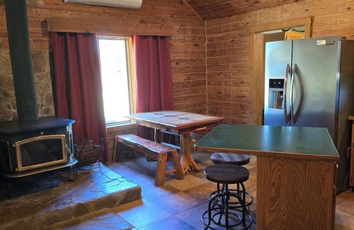 Stockton Cabin | Secluded Cabin - Hunt + Fish + Float Sac River/Stockton. Family and Pet Friendly