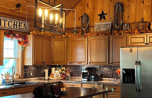 Abbot Cabin | Relaxing in the peaceful woods of Northern Maine is the goal here at the Lodge