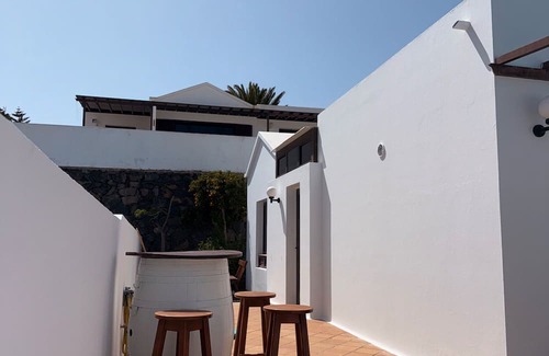 Tias House | Vacation Home 'Timanfaya' with Sea View, Private Pool and Wi-Fi