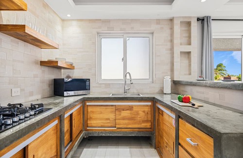 Ponton Apartment | Spacious 2BR Aruba Home with a Pool, BBQ, Full Equipped Kitchen & Gated Backyard