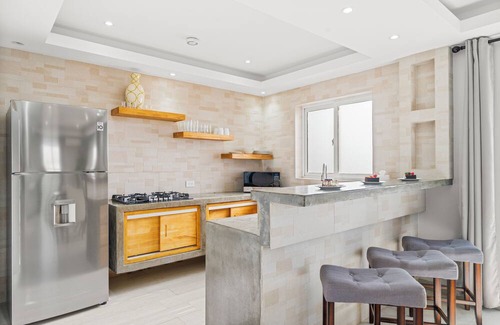 Ponton Apartment | Spacious 2BR Aruba Home with a Pool, BBQ, Full Equipped Kitchen & Gated Backyard