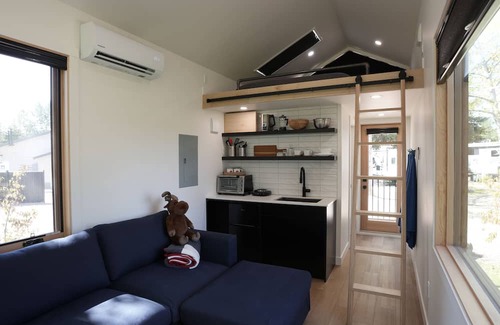 Rocky Mountain House Cabin | River South HardTop: modern decked-out cabin with a river view