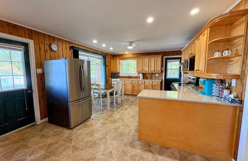 Springfield House | Lakefront Escape with Hot Tub and Outdoor Kitchen
