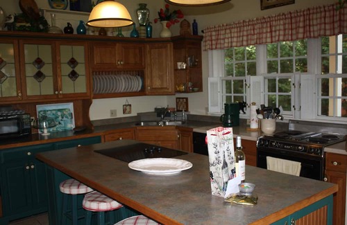 Cape May Point House | Pristine, Cozy, 4 bedroom Beach Cottage with a 40 foot screened in front porch!