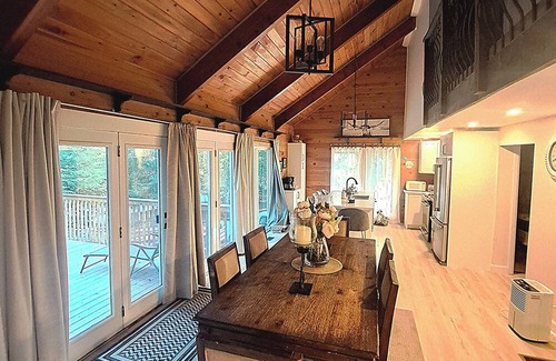 Dysart et al Ski Chalet | Romantic Retreat with King Suite, Luxurious Chalet Surrounded by Towering Maples