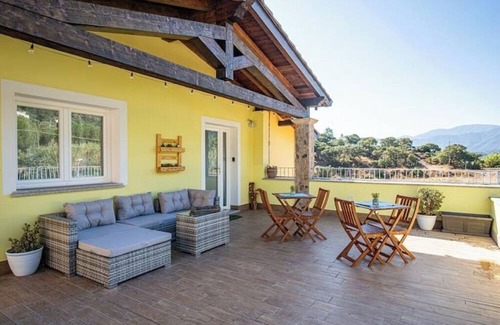 Guspini House | Cozy atmosphere in the room with private bathroom