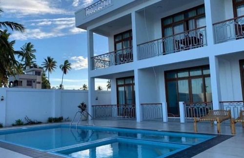 Pwani Mchangani Villa | Villa Blue FishnIt's is Beach Front Villa with Swimming Pool suitable for famil