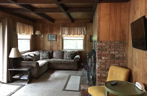 Conway Ski Chalet | Waterfront Chalet with private beach in the White Mountains of New Hampshire.