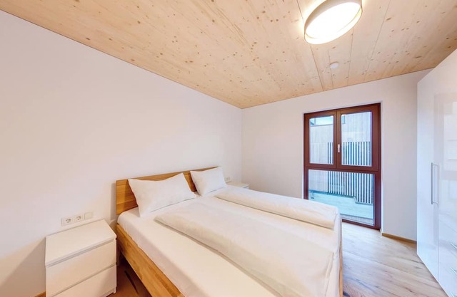Urban-Apartmenthaus zwischen Berg und See