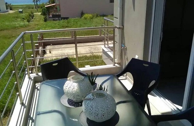 Crystallia SeaSide Maisonette by RentlsPro