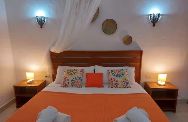 A large room for two fully equipped with a private terrace.