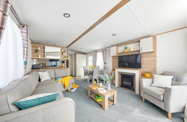 Stylish and spacious 12ft-wide caravan with one double and two twin.