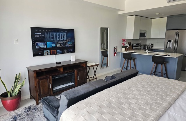 Chic Studio Retreat w/King Bed, Fireplace + Pool