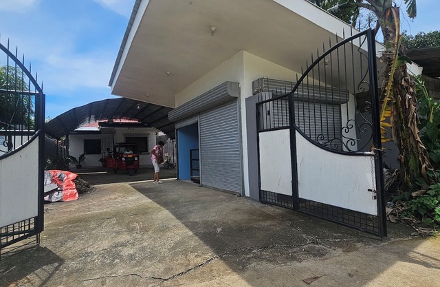 Charming 2-bedroom house in welcoming Ozamiz with AC, 4 vehicles can park inside