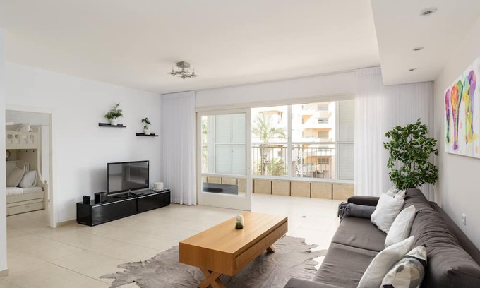 Netanya Apartment | Bright and Fresh Family Home near Beach by FeelHome