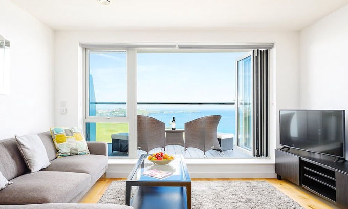 Lusty Glaze Apartment | 32 ONE Lusty Glaze - Apartment with breath taking sea and coastal views, lift, car parking
