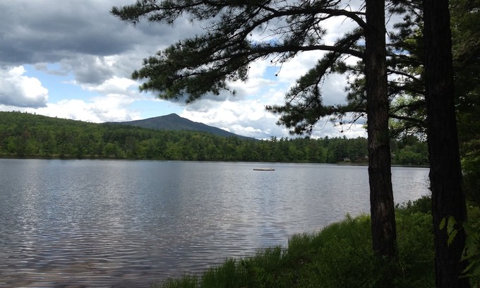 Conway Ski Chalet | Waterfront Chalet with private beach in the White Mountains of New Hampshire.