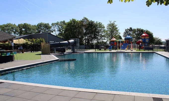 Lathum Ski Chalet | Chalet With Pond View in Gelderland