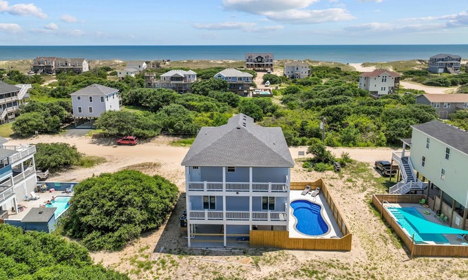 Carova Beach Cottage | Brand New Beach House with Ocean Views, Elevator, Game Room and Inground Pool!