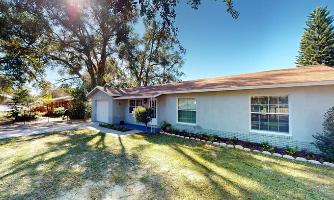 Eagle Lake House | Dog-friendly charming home with enclosed pool, large lanai, desk, & open layout