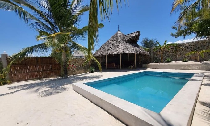 Bwejuu Beach Apartment | SAND BEACH PALM RESIDENCE