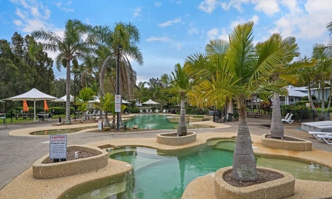 Cams Wharf Villa | Elysian Escape - 4 Pools, Lakeside, Resort Amenities