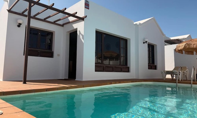 Tias House | Vacation Home 'Timanfaya' with Sea View, Private Pool and Wi-Fi